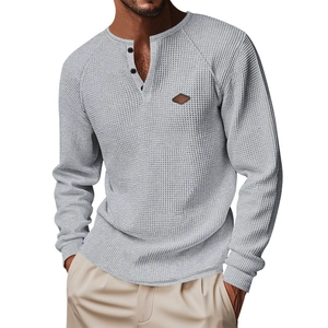 Men's light grey waffle knit long sleeve Henley shirt with button neckline and leather patch