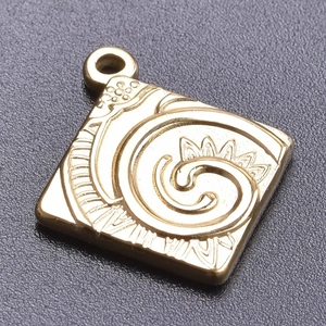 Macro shot of 18k gold plated square pendant with embossed spiral pattern and wavy lines