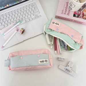 Large capacity aesthetic pencil case with heart button in pink and mint green tones