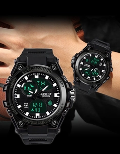 Close-up of black waterproof sports watch with dual digital display and 30M water resistance