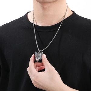 Punk vintage stainless steel wolf head pendant necklace on a male model wearing black