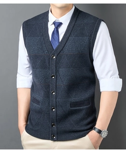 Detail view of navy blue knit vest featuring V-neck and classic button-down front