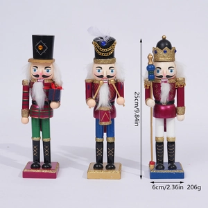Three 25cm wooden nutcracker soldiers including drummer and king with glitter details