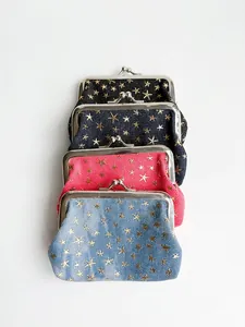 Set of four denim coin purses with gold star patterns and classic metal kiss-lock closure