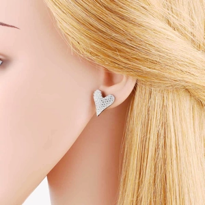 Elegant heart-shaped stud earrings featuring sparkling zircon inlay in silver plating