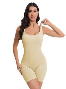 Detailed shot of beige ribbed seamless romper featuring a U-neck and bodycon fit