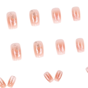 Pink gradient press-on nails with silver glitter and foil details in square-oval shape