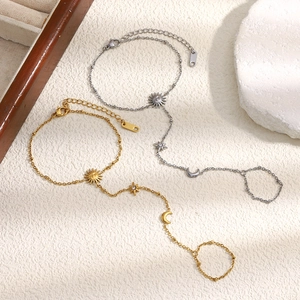 Bracelet esclave en acier inoxydable plaqué or 18K avec breloques soleil et lune