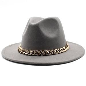Detail of grey wool felt fedora featuring a decorative thick gold link chain strap