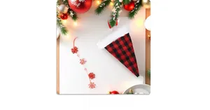 Detail of red and black buffalo plaid Christmas cutlery holder with white plush fur trim