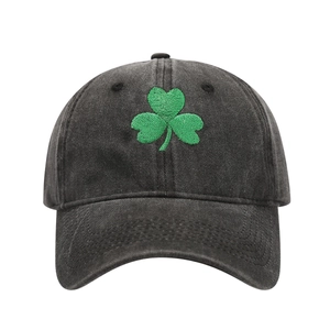 Washed black baseball cap with green clover embroidery for St. Patrick's Day fashion