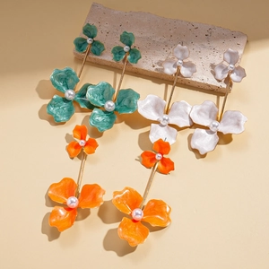 Bohemian floral drop earrings with pearls and colorful enamel petals in three vibrant colors
