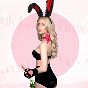 Detail of plush bunny ear headband, satin bow tie, paw gloves and tail for Easter