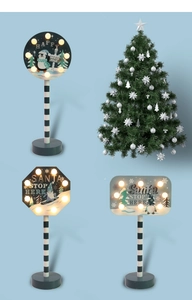 Detailed collage of LED Christmas signposts with Happy and North Pole slogans