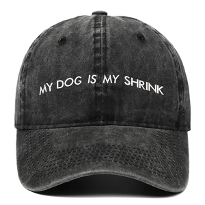 Washed black cotton baseball cap featuring My Dog Is My Shrink white embroidery