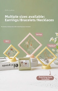 Detailed view of square PE film jewelry display cases in pastel pink and green colors