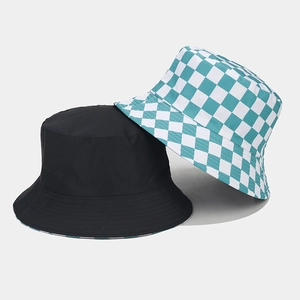 Detail showing classic black and green-white checkerboard patterns on bucket hats