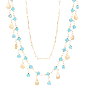 Double-layered gold shell pendant necklace with blue crystals in a summer bohemian design