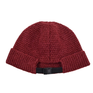 Detail of burgundy knitted docker hat showing adjustable back strap and plastic buckle