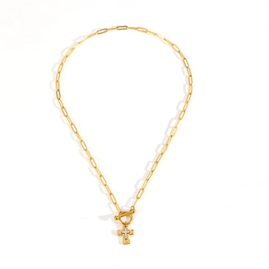 Pendentif croix bicolore or et argent sur un collier à fermoir OT pour femmes élégant