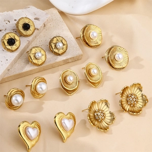 Luxurious gold stainless steel pearl earrings set in flower and heart shapes