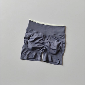 Detailed view of high-waisted seamless yoga shorts with scrunch butt lift and rib fabric