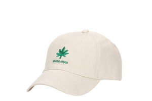 Detailed close-up of cream cotton twill cap featuring green maple leaf embroidery