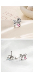 Macro detail of bow heart stud earrings with cubic zirconia and secure screw back closure