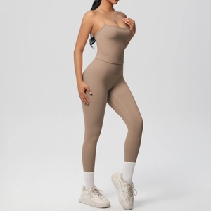 Detail view of brown yoga set featuring high-waisted leggings and slim-fit camisole top