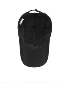 Interior detail of black quick-dry baseball cap featuring breathable mesh lining