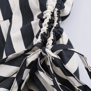 Women's trendy black and white striped long sleeve shirt with side drawstring ruched detail