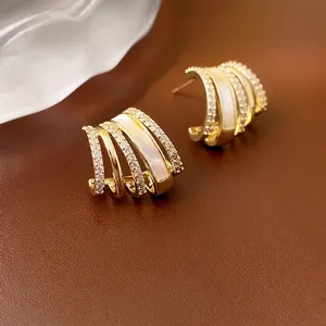18K gold plated C-shaped earrings with mother of pearl and cubic zirconia stones