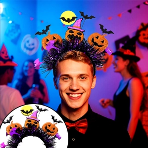 Detail of Halloween headband with orange sequined pumpkin and black bat decorations
