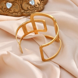 Chic 18K gold-plated stainless steel open cuff bracelet with hollow geometric design