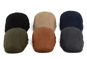 Vue détaillée de six couleurs de casquettes plates en daim vintage disposées en grille