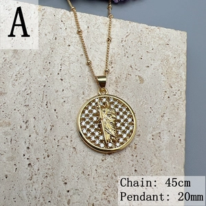 Golden Virgin of Guadalupe pendant necklace with zircon crystals on a bead chain
