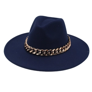 Detail view of navy blue wide brim fedora with rose gold acrylic chain decoration