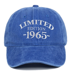 Detailed close-up of LIMITED EDITION 1965 embroidery on blue washed denim baseball cap