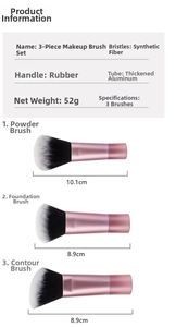 Detailed view of 3 mini makeup brushes with fiber bristles and pink handles for travel