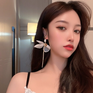 Elegant white faux pearl lace bow drop earrings with long gold tassels for women