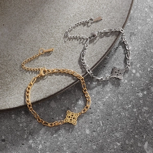 Gold and silver stainless steel Figaro bracelets with hollow concentric circle pendants