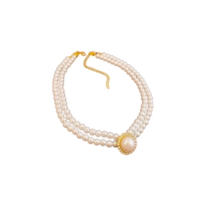 French vintage double-layer pearl necklace with gold diamond pendant on white background