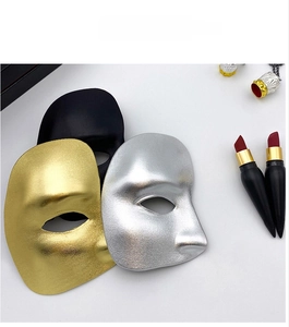 Close-up of three half-face phantom masks in gold, silver, and black with matte finish