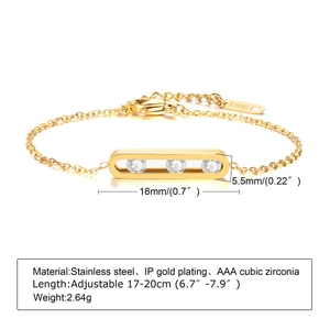 Detailed view of adjustable gold stainless steel bracelet with cubic zirconia cross