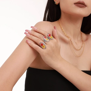 Artistic stainless steel open ring featuring red and yellow dried flowers in resin