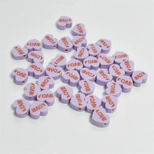 Bulk purple 10mm heart-shaped clay beads with LOVE print for DIY jewelry making