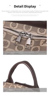 Detail of the dual metal zippers and brown leather handle on a vintage printed backpack