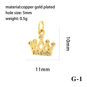 Detailed view of an 18K gold plated crown charm with white zircon and 11x10mm dimensions