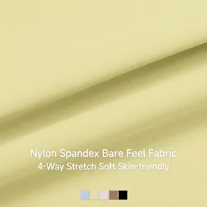 Pale yellow naked-feel yoga vest with four-way stretch fabric and skin-friendly texture