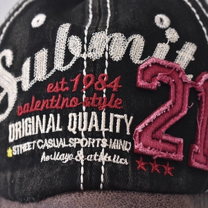 Vintage washed cotton baseball cap with premium embroidery and leather brim detail